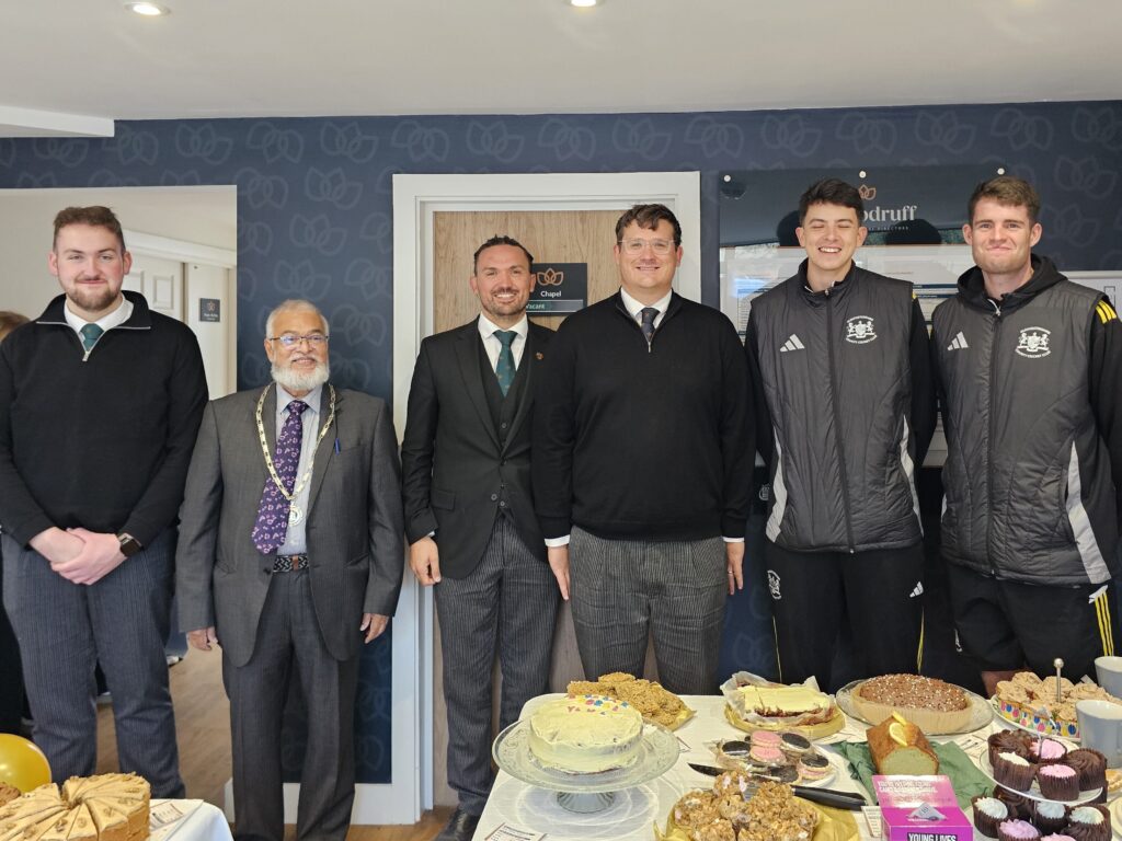 3 Funeral Directors stand alongside the Mayor of Yate and Two Gloucestershire Cricketers at Charity Bake Sale.